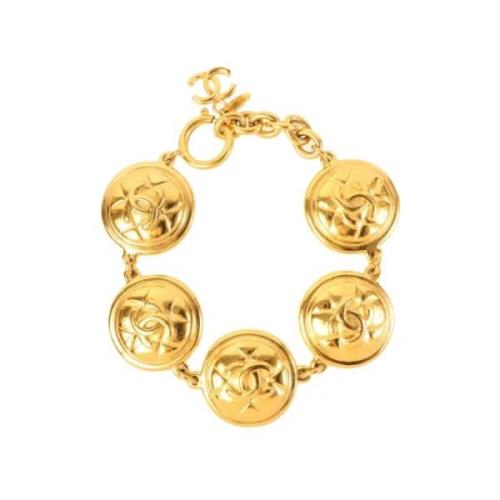 Pre-owned Metal bracelets Chanel Vintage , Yellow , Dames