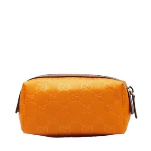 Pre-owned Leather clutches Gucci Vintage , Orange , Dames