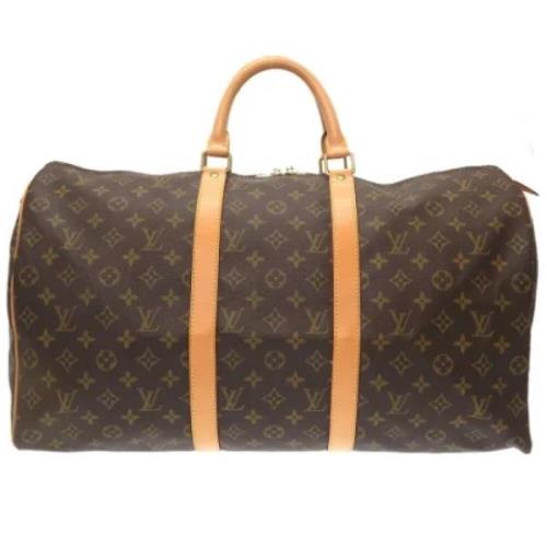 Pre-owned Canvas handbags Louis Vuitton Vintage , Brown , Dames