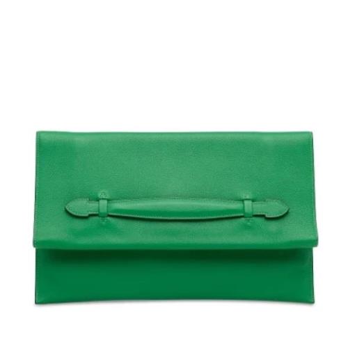 Pre-owned Leather clutches Hermès Vintage , Green , Dames