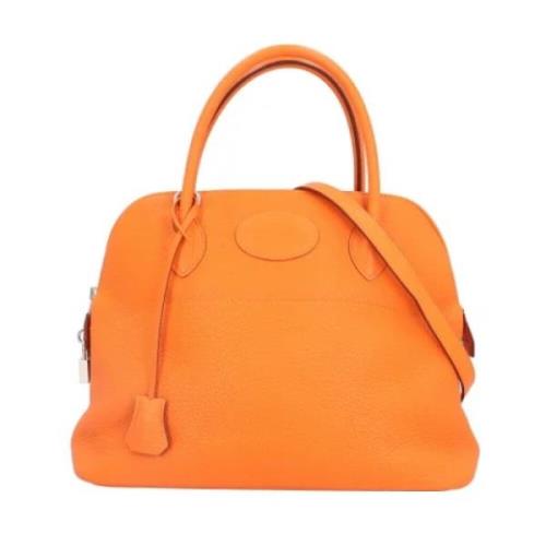 Pre-owned Fabric shoulder-bags Hermès Vintage , Orange , Dames