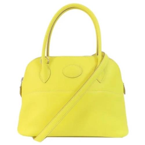 Pre-owned Fabric handbags Hermès Vintage , Yellow , Dames