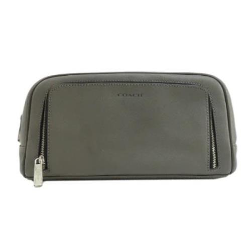 Pre-owned Fabric clutches Coach Pre-owned , Green , Dames