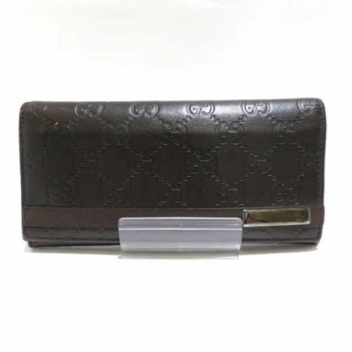 Pre-owned Leather wallets Gucci Vintage , Brown , Unisex