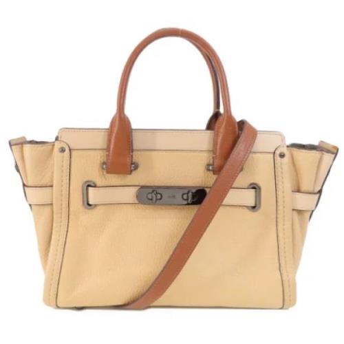 Pre-owned Fabric handbags Coach Pre-owned , Beige , Dames