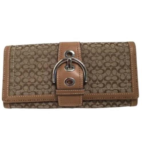 Pre-owned Fabric clutches Coach Pre-owned , Brown , Dames