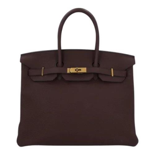 Pre-owned Leather handbags Hermès Vintage , Brown , Dames