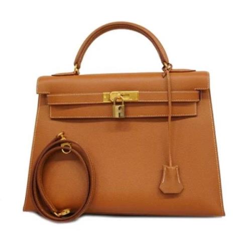 Pre-owned Fabric handbags Hermès Vintage , Brown , Dames