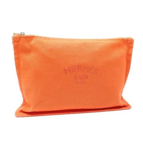 Pre-owned Fabric pouches Hermès Vintage , Orange , Dames