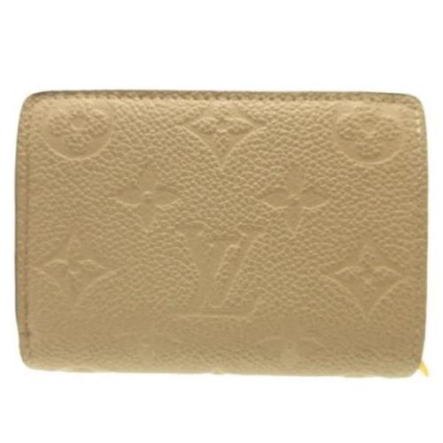 Pre-owned Fabric wallets Louis Vuitton Vintage , Beige , Dames