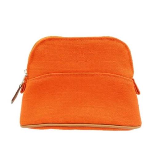 Pre-owned Fabric pouches Hermès Vintage , Orange , Dames