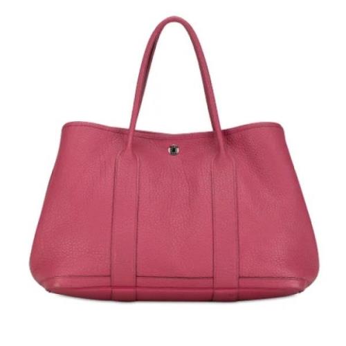 Pre-owned Leather handbags Hermès Vintage , Pink , Dames