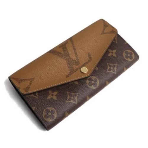 Pre-owned Leather wallets Louis Vuitton Vintage , Brown , Dames