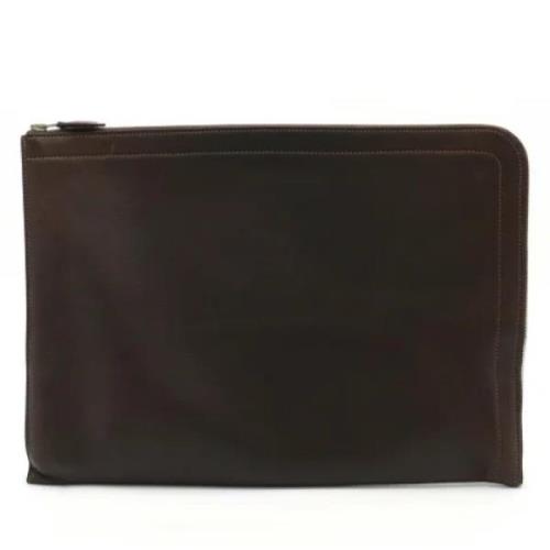 Pre-owned Leather clutches Hermès Vintage , Brown , Dames