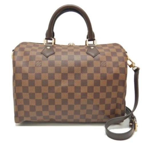 Pre-owned Fabric handbags Louis Vuitton Vintage , Brown , Dames