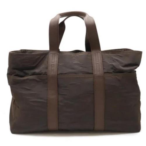 Pre-owned Nylon handbags Hermès Vintage , Brown , Dames