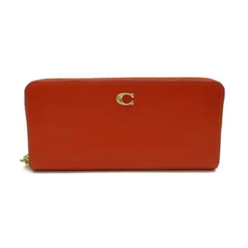 Pre-owned Leather wallets Coach Pre-owned , Orange , Dames