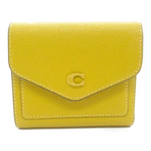 Pre-owned Leather wallets Coach Pre-owned , Yellow , Dames