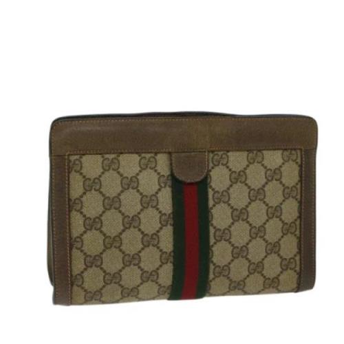 Pre-owned Leather clutches Gucci Vintage , Brown , Dames