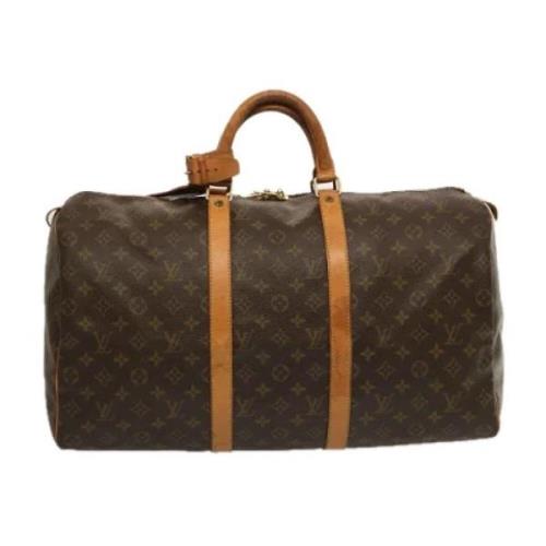 Pre-owned Canvas handbags Louis Vuitton Vintage , Brown , Dames