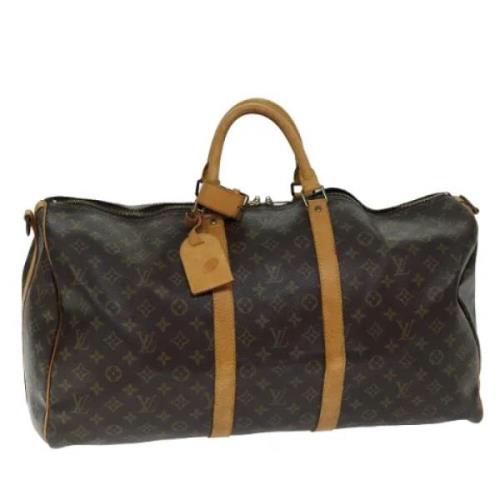 Pre-owned Canvas handbags Louis Vuitton Vintage , Brown , Dames