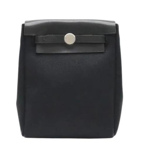 Pre-owned Leather clutches Hermès Vintage , Black , Dames