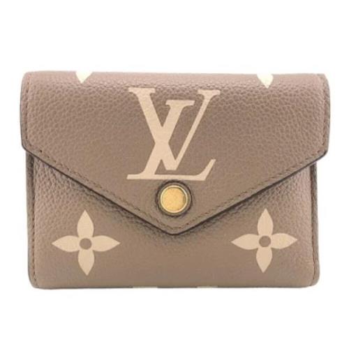 Pre-owned Leather wallets Louis Vuitton Vintage , Beige , Dames