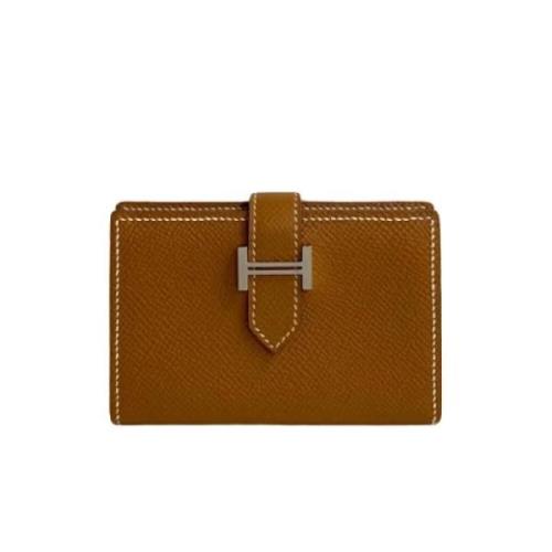 Pre-owned Canvas wallets Hermès Vintage , Brown , Dames