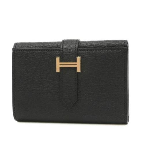 Pre-owned Canvas wallets Hermès Vintage , Black , Dames