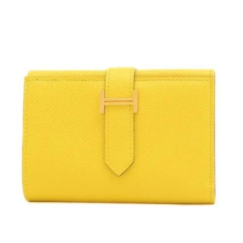 Pre-owned Canvas wallets Hermès Vintage , Yellow , Dames