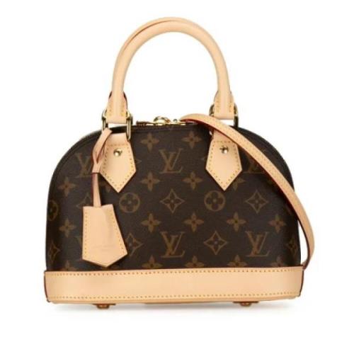 Pre-owned Plastic handbags Louis Vuitton Vintage , Brown , Dames