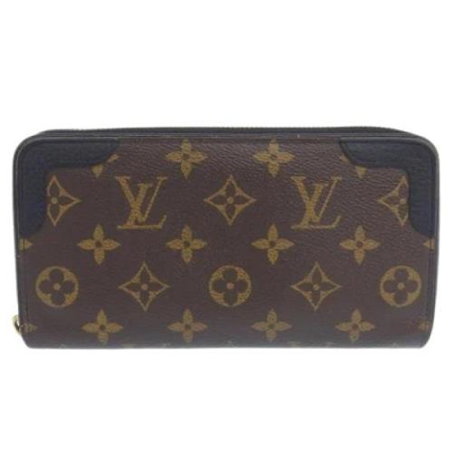 Pre-owned Leather wallets Louis Vuitton Vintage , Brown , Dames