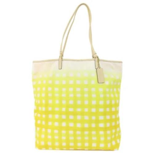 Pre-owned Nylon totes Coach Pre-owned , Yellow , Dames