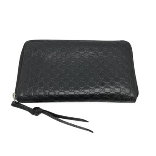 Pre-owned Leather wallets Gucci Vintage , Black , Dames