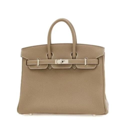 Pre-owned Leather handbags Hermès Vintage , Beige , Dames