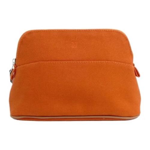 Pre-owned Canvas pouches Hermès Vintage , Orange , Dames