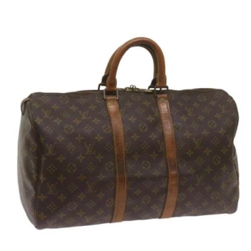 Pre-owned Canvas travel-bags Louis Vuitton Vintage , Brown , Dames