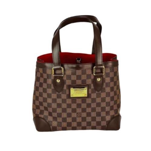 Pre-owned Canvas clutches Louis Vuitton Vintage , Brown , Dames