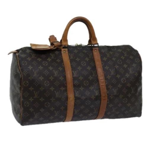 Pre-owned Canvas travel-bags Louis Vuitton Vintage , Brown , Dames