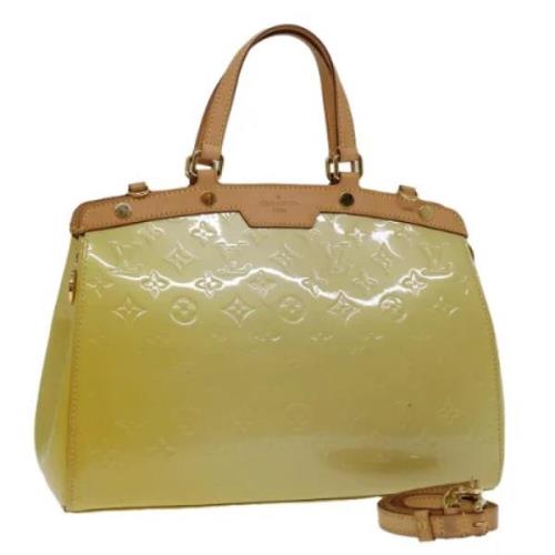 Pre-owned Leather handbags Louis Vuitton Vintage , Beige , Dames