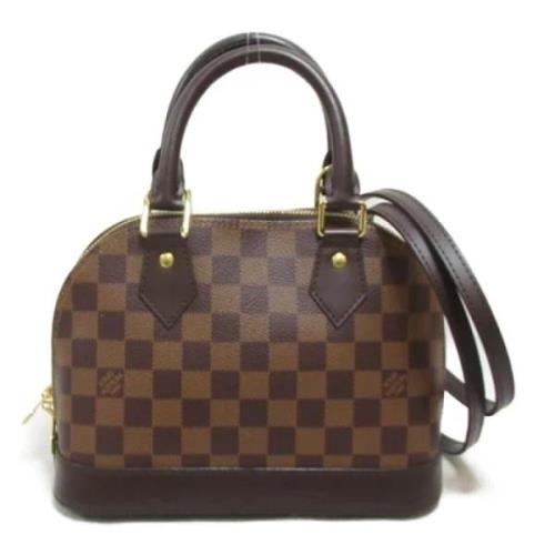 Pre-owned Canvas handbags Louis Vuitton Vintage , Brown , Dames