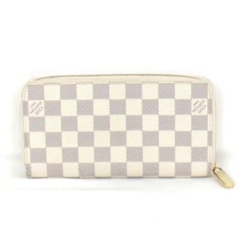 Pre-owned Canvas wallets Louis Vuitton Vintage , Beige , Dames