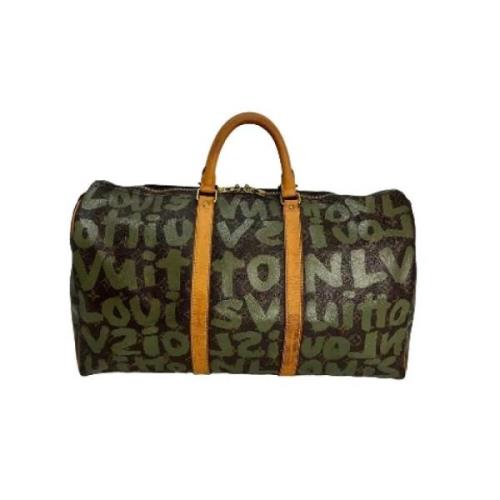 Pre-owned Canvas handbags Louis Vuitton Vintage , Green , Dames