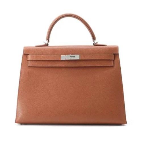 Pre-owned Leather handbags Hermès Vintage , Brown , Dames