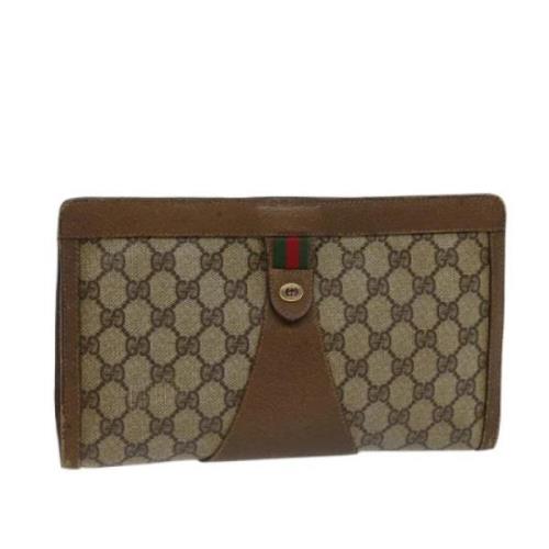 Pre-owned Leather clutches Gucci Vintage , Brown , Dames