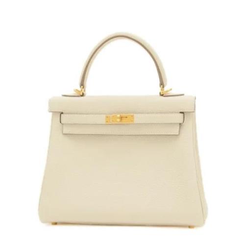 Pre-owned Leather handbags Hermès Vintage , Beige , Dames