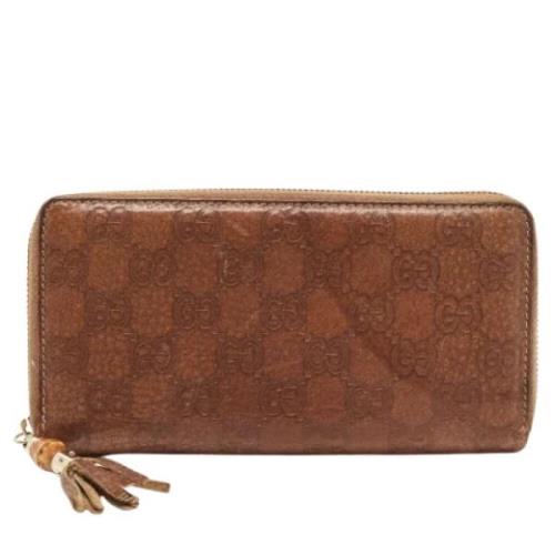 Pre-owned Leather wallets Gucci Vintage , Brown , Dames