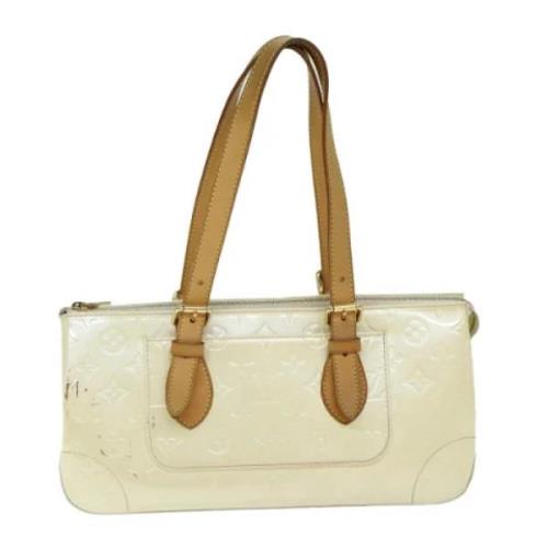 Pre-owned Leather handbags Louis Vuitton Vintage , Beige , Dames