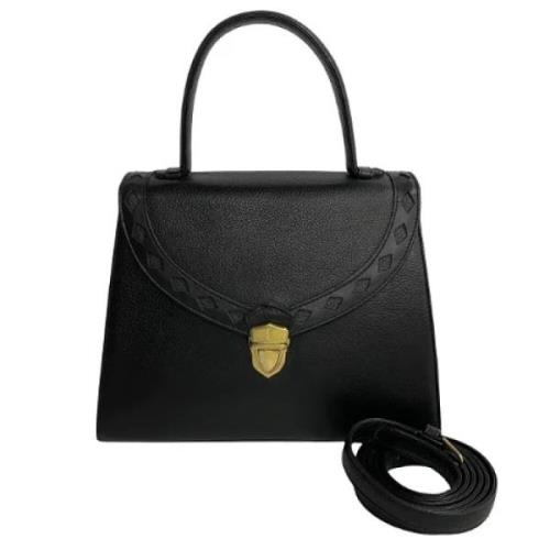 Pre-owned Leather handbags Yves Saint Laurent Vintage , Black , Dames