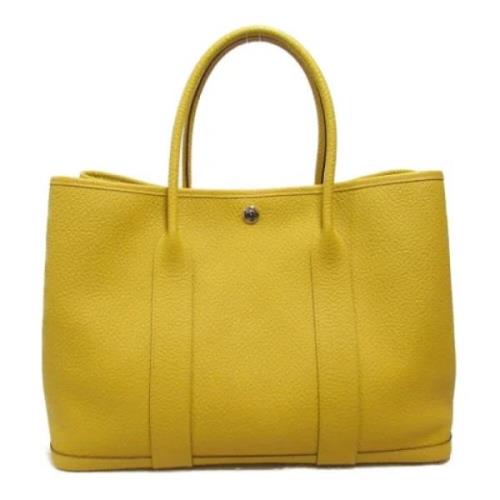 Pre-owned Leather handbags Hermès Vintage , Yellow , Dames